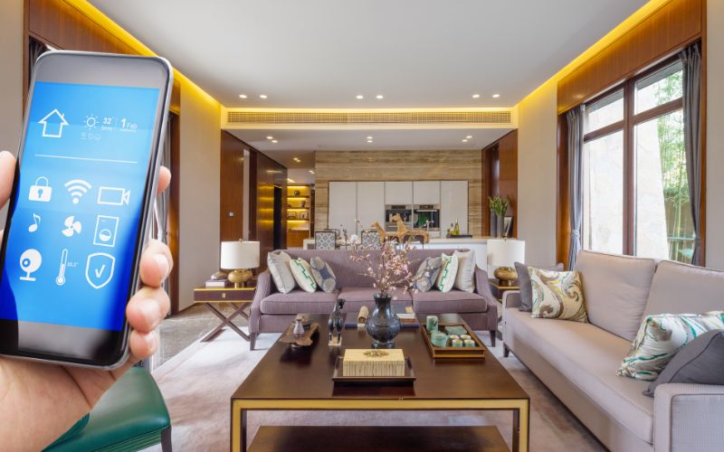 Smart home setup by Empire Electric in Gilroy, showcasing the integration of home automation systems controlled by a smartphone app.